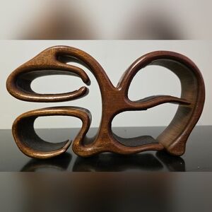 Elegant Brown Wooden Sculpture